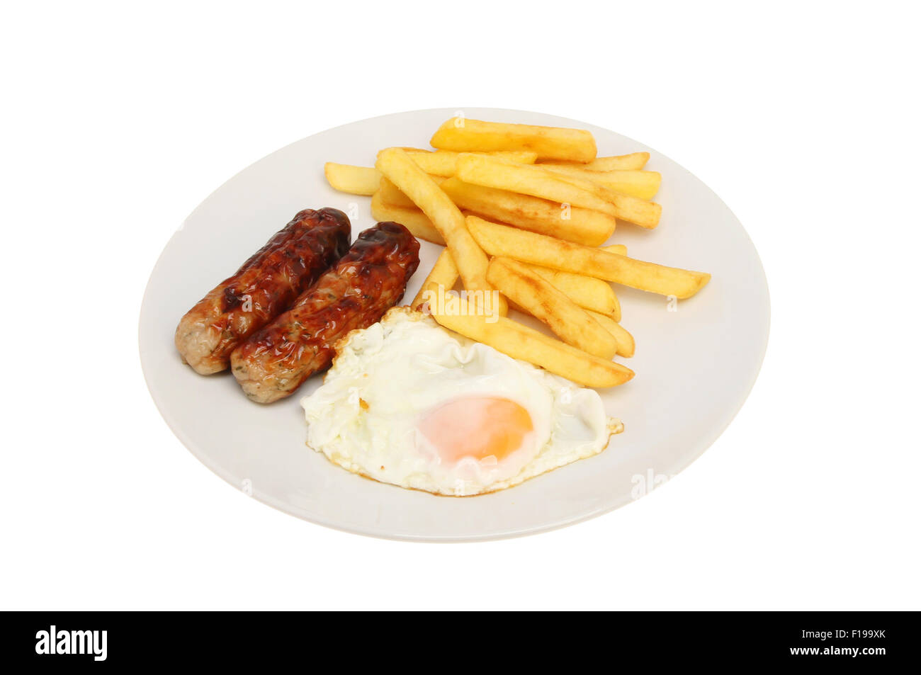 Sausage, fried egg and chips on a plate isolated against white Stock Photo