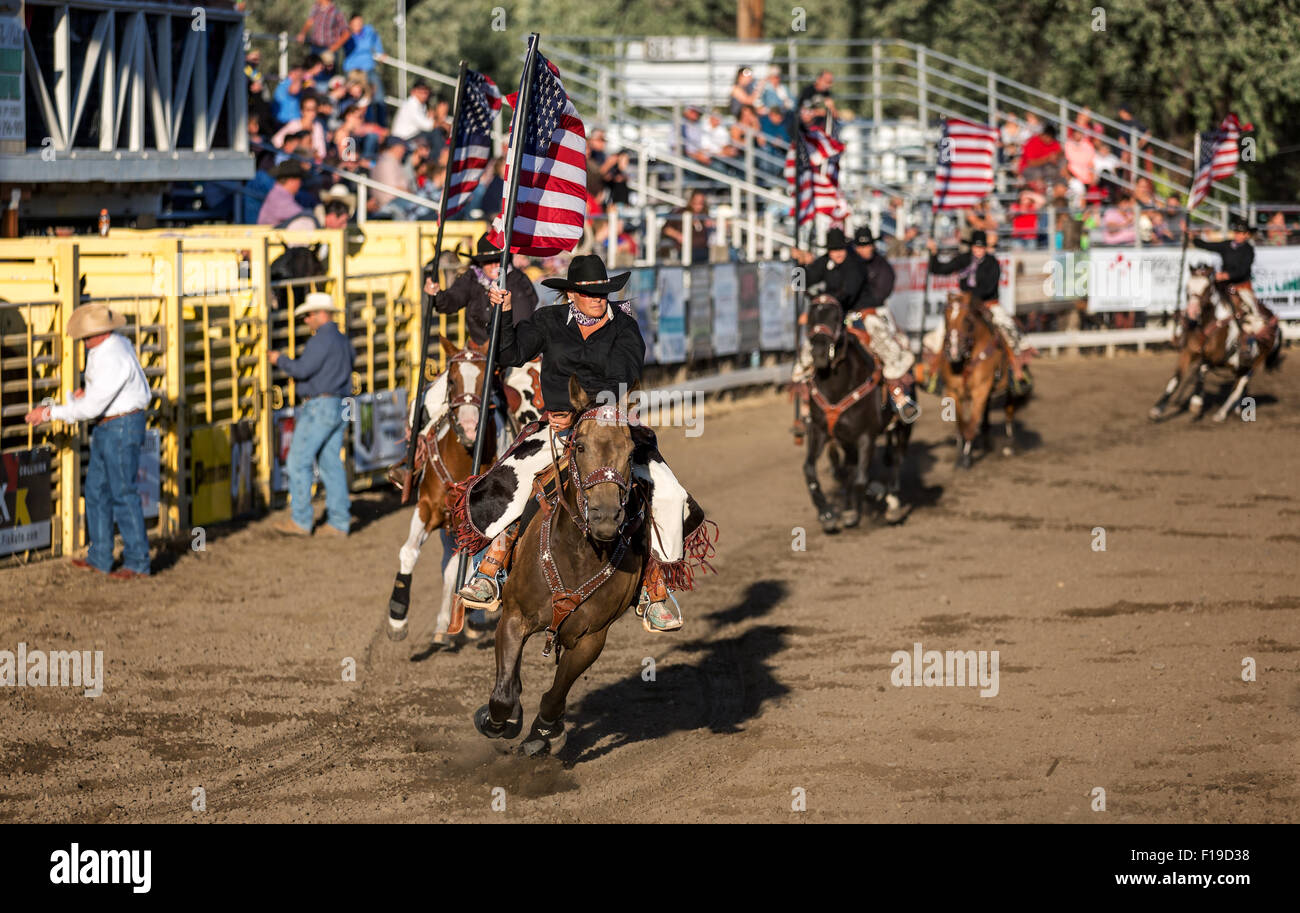 Color guards with American flags at the opening ceremonies of a rodeo,The Fort Dalles Rodeo, Oregon, USA Stock Photo