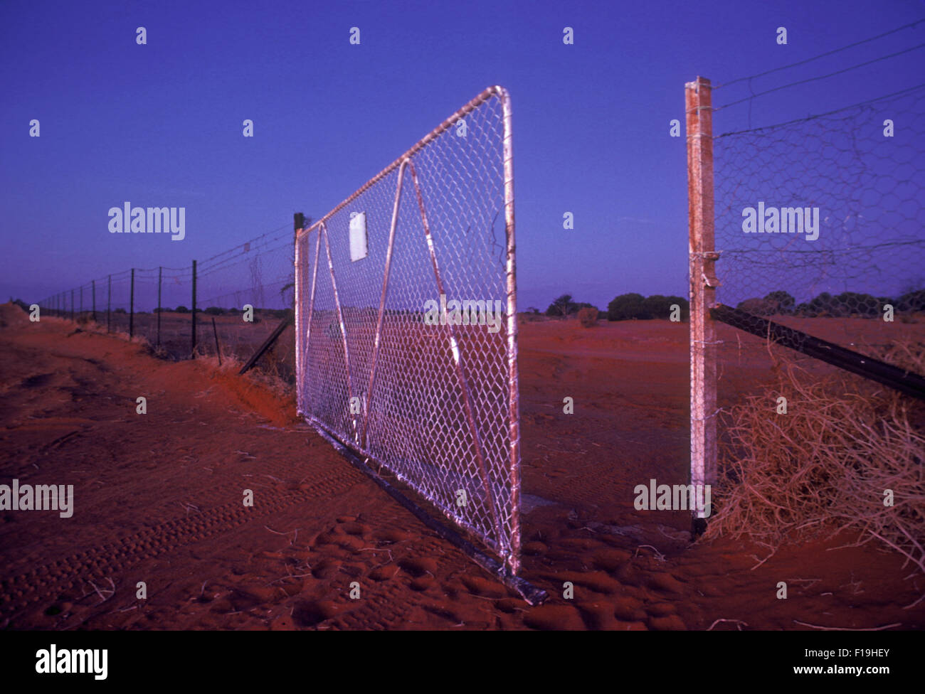 ONE OF THE MANY GATES ALONG THE DINGO FENCE IN OUTBACK AUSTRALIA. Stock Photo