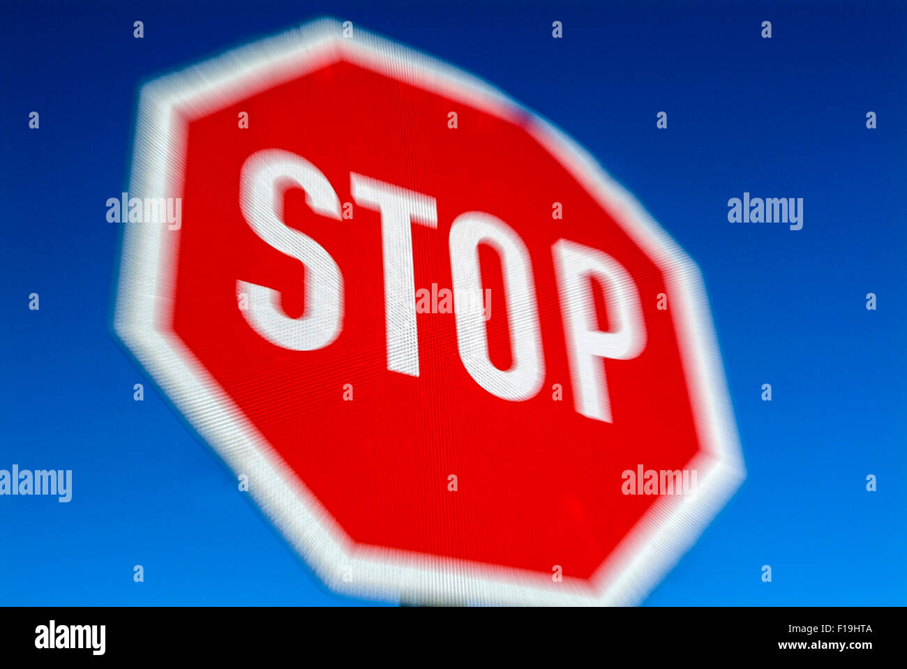 Stop sign zoomed blurred in austria europe Stock Photo