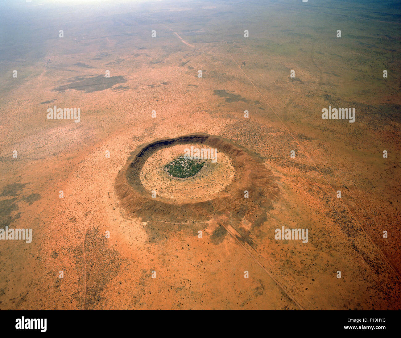 AERIAL VIEW OVER WOLFE CREEK CRATER NATIONAL PARK ON THE EDGE OF THE GREAT SANDY DESERT IN THE EAST KIMBERLEY Stock Photo