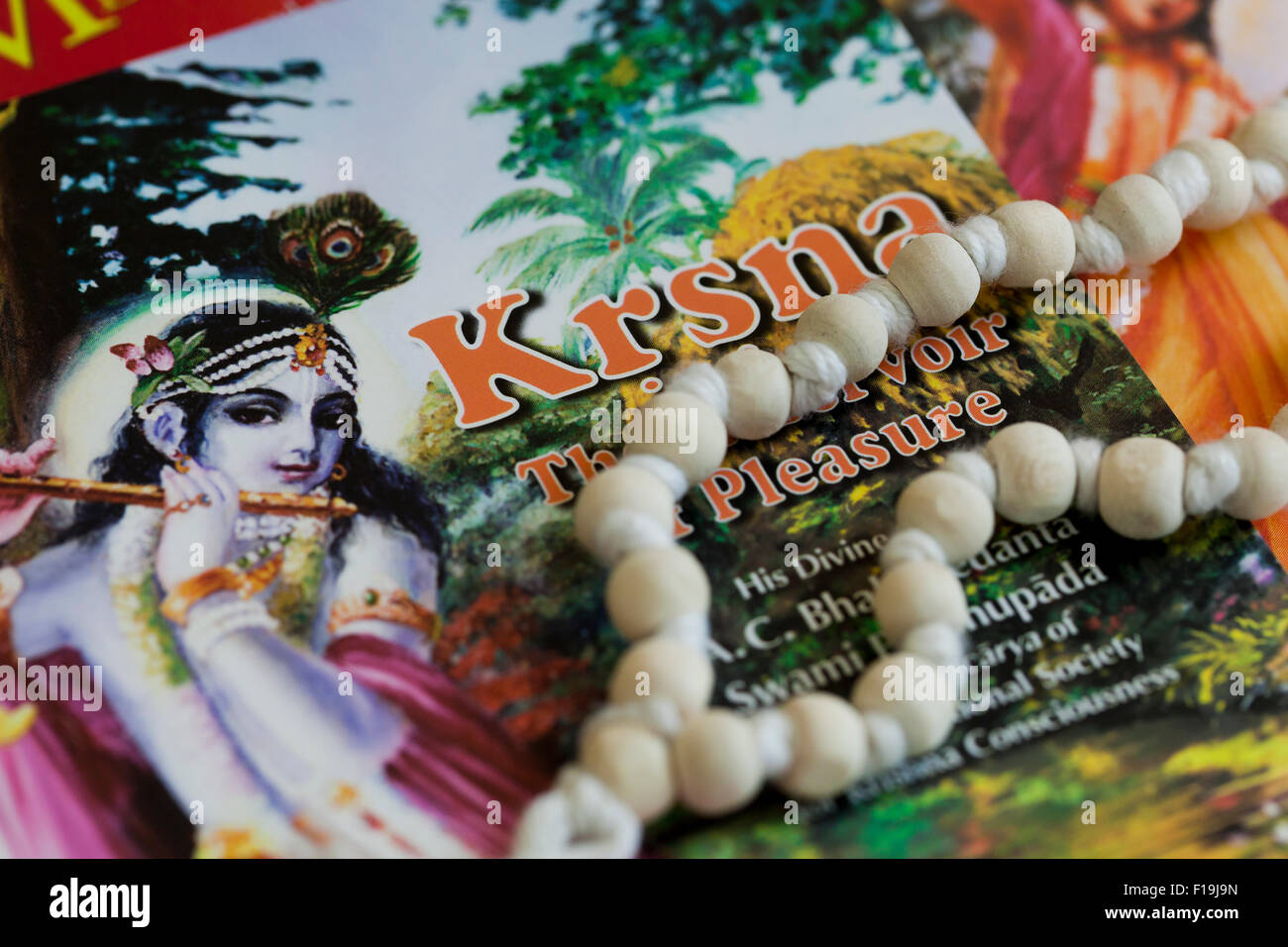 Krishna related books and meditation bead Stock Photo