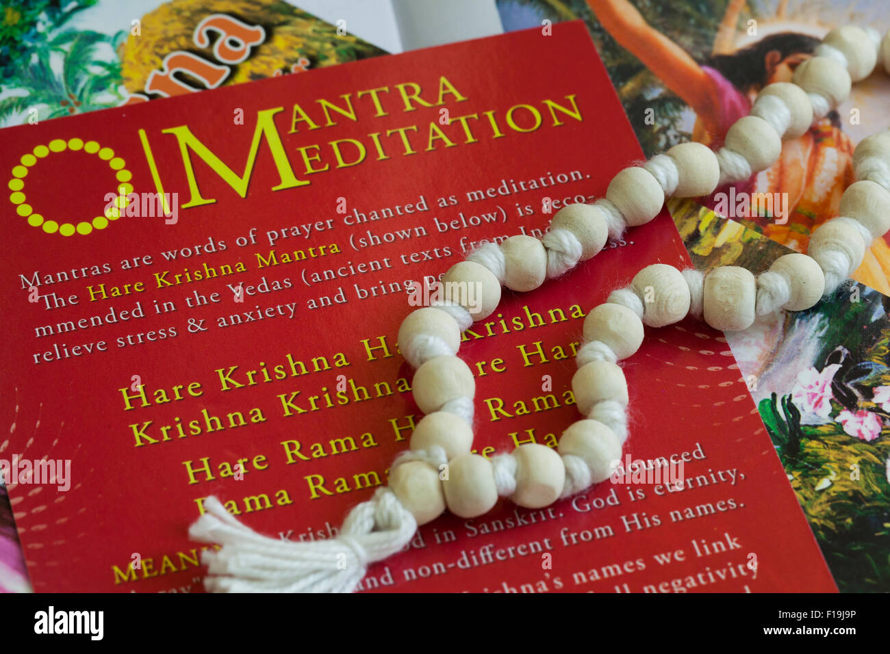 Krishna related books and meditation bead Stock Photo