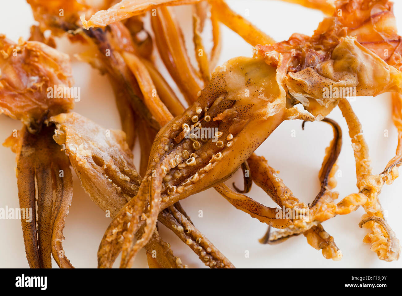 Japanese dried squid snack Stock Photo - Alamy