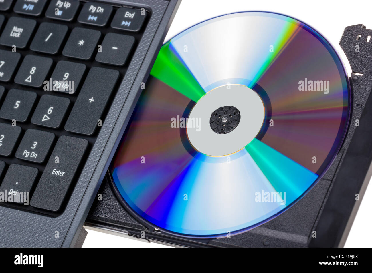 Electronic collection laptop with open dvd tray isolated on a white