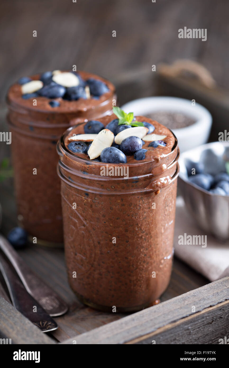 Healthy vegan chocolate chia pudding in jars Stock Photo