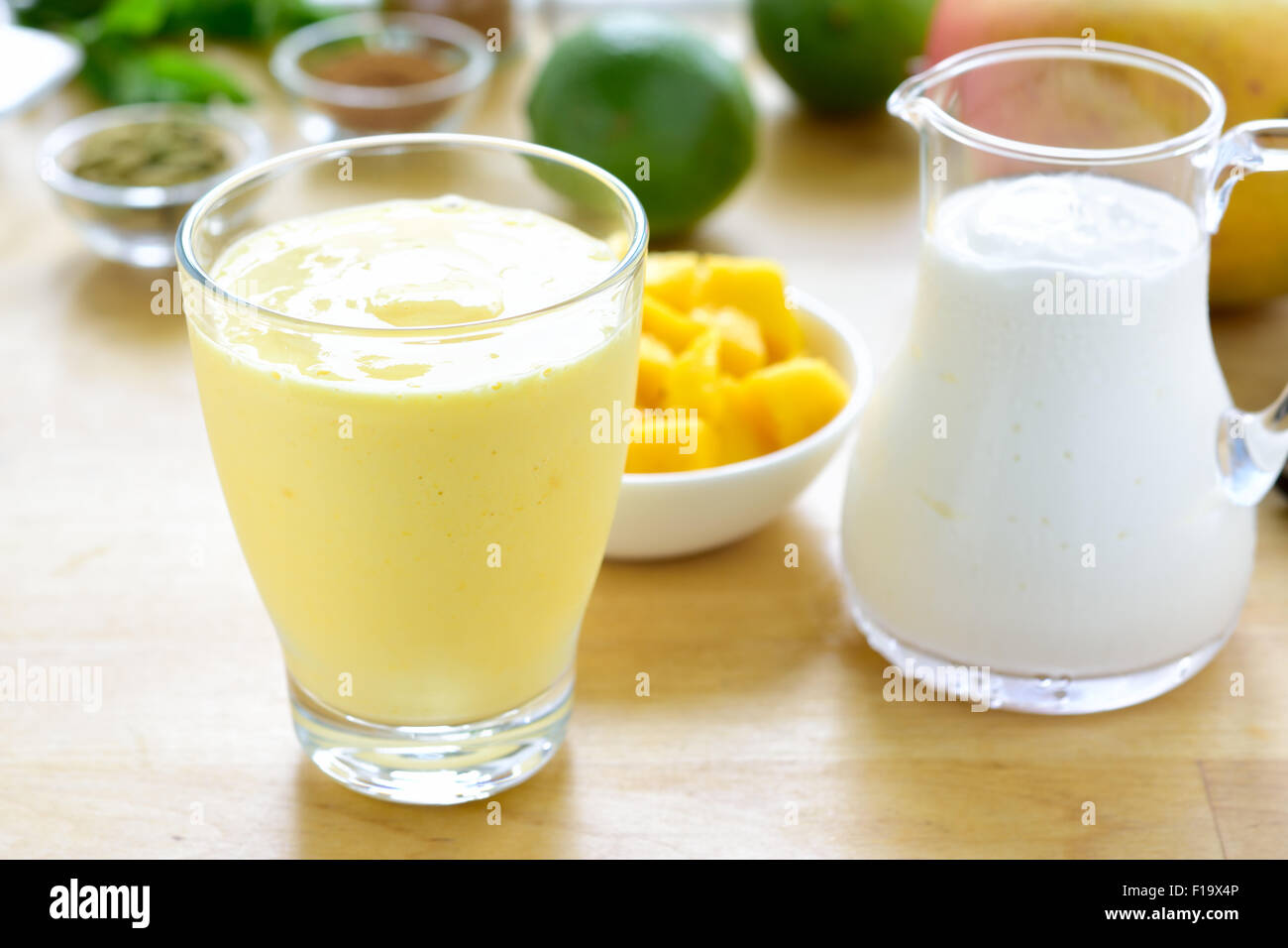 Mango lassi. Mango smoothie made with mango and yogurt, yoghurt. Selective focus. Stock Photo
