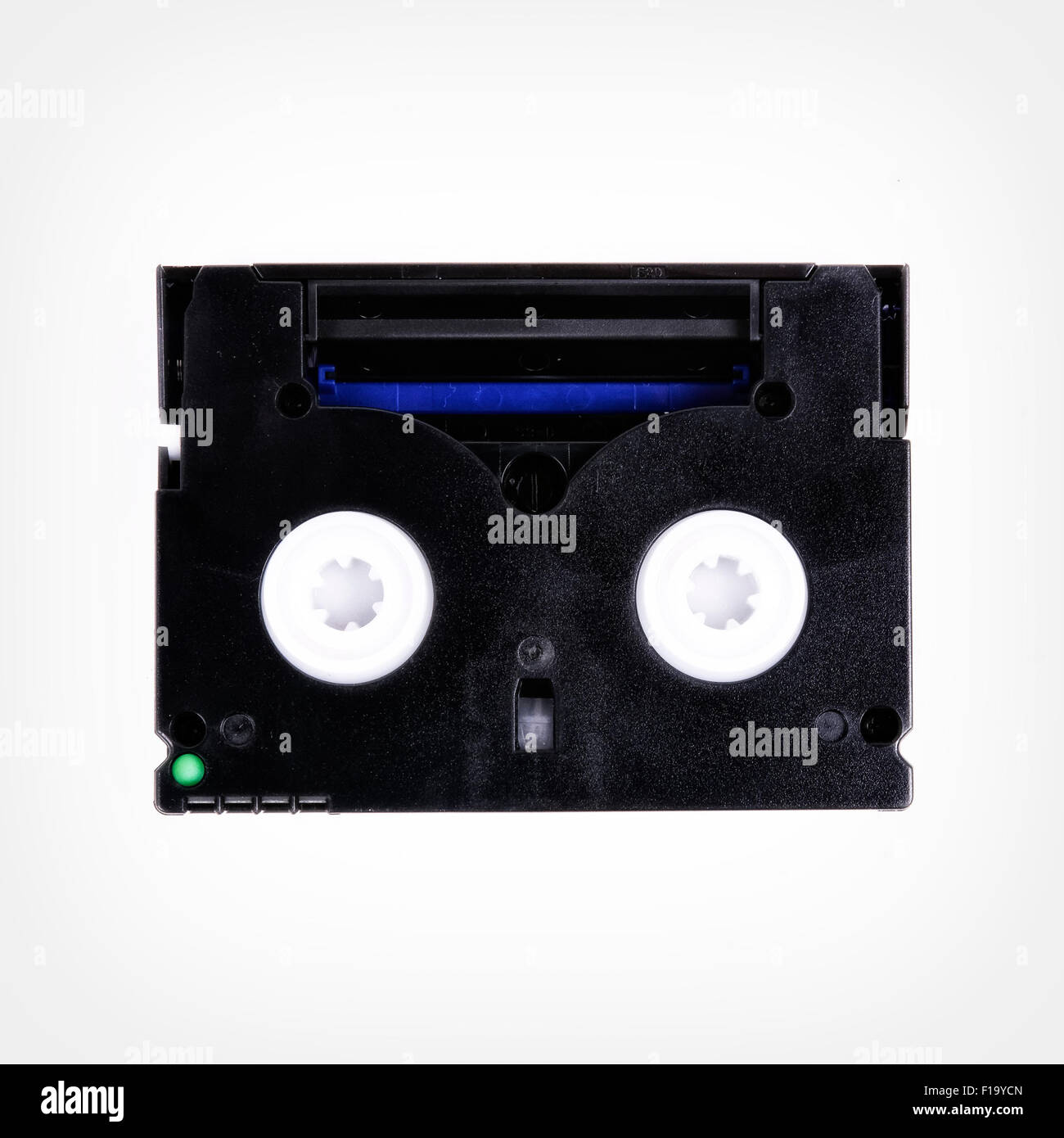Cassette into the camera isolated on a white background Stock Photo Alamy