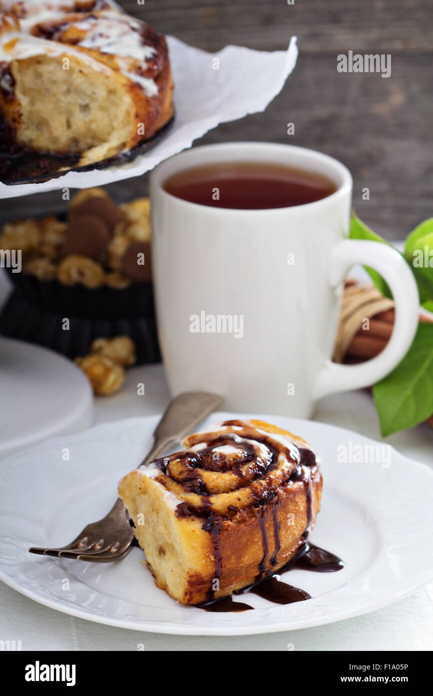 Cinnamon buns with chocolate and cream cheese glaze Stock Photo Alamy