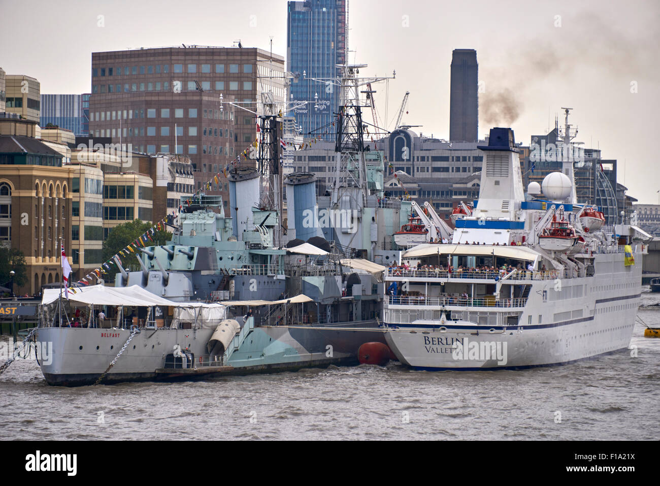 HMS Belfast is a museum ship, originally a Royal Navy light cruiser, permanently moored in London on the River Thames Stock Photo
