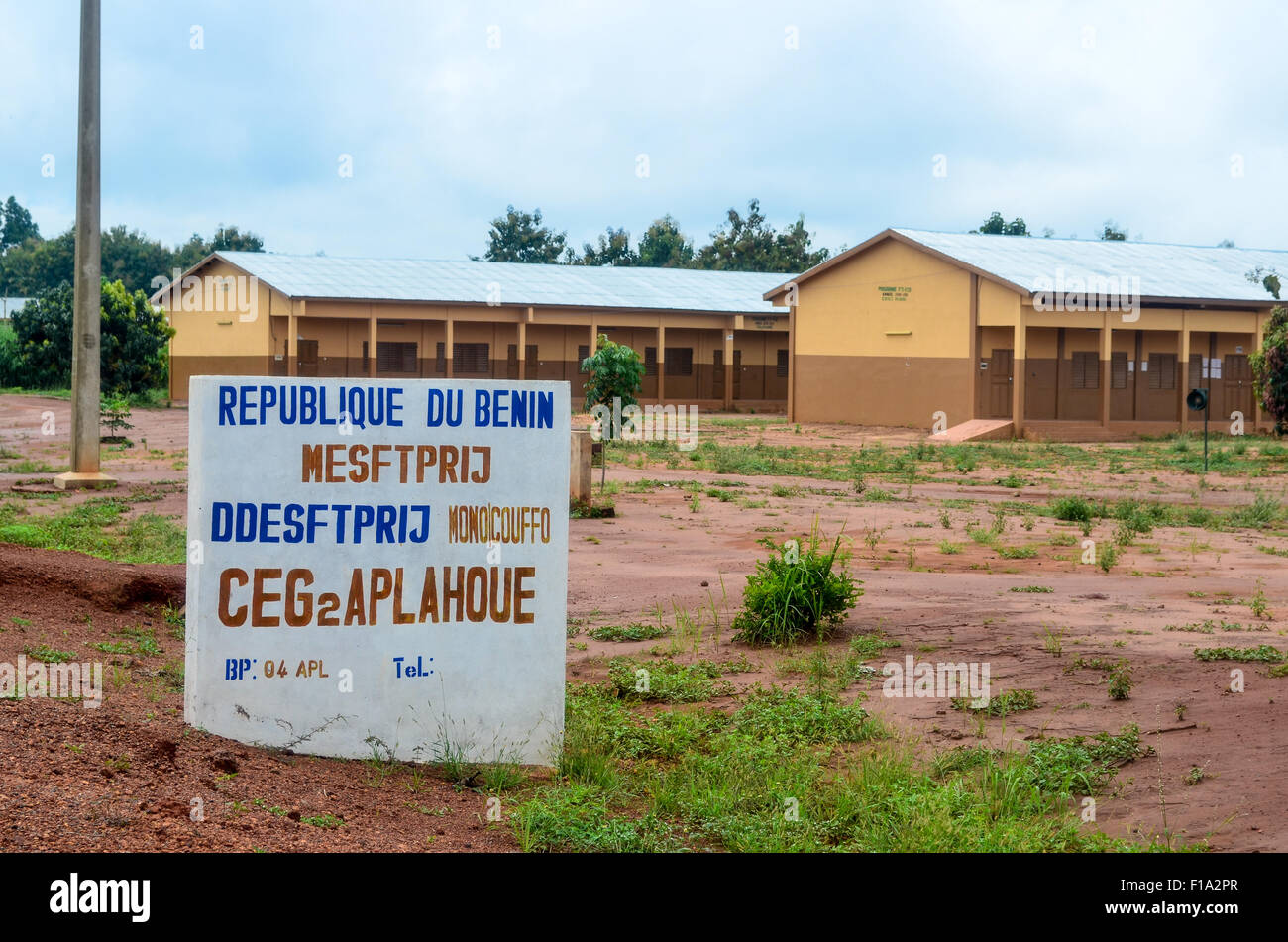 School sign in Benin and school buildings Stock Photo