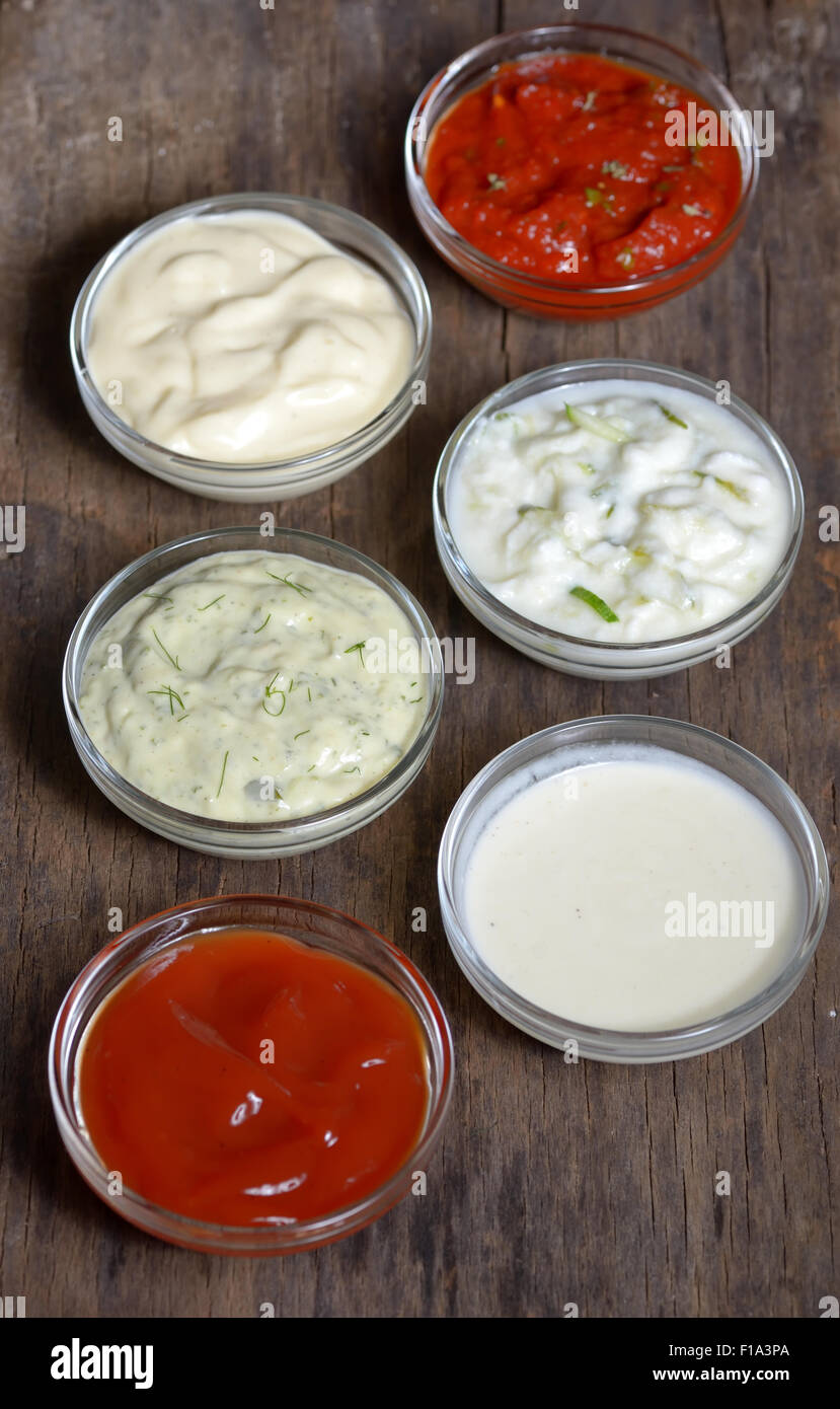 various type of  sauces on old wood Stock Photo