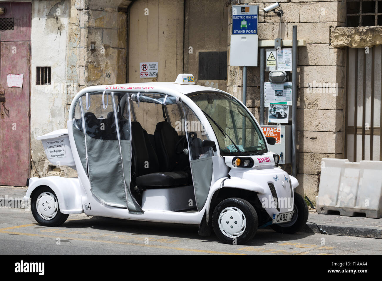 Electric mini cab. Valletta Malta. Stock Photo