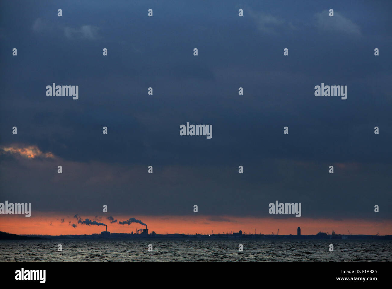 Wismar, Germany, view at dusk from the water to the city Stock Photo
