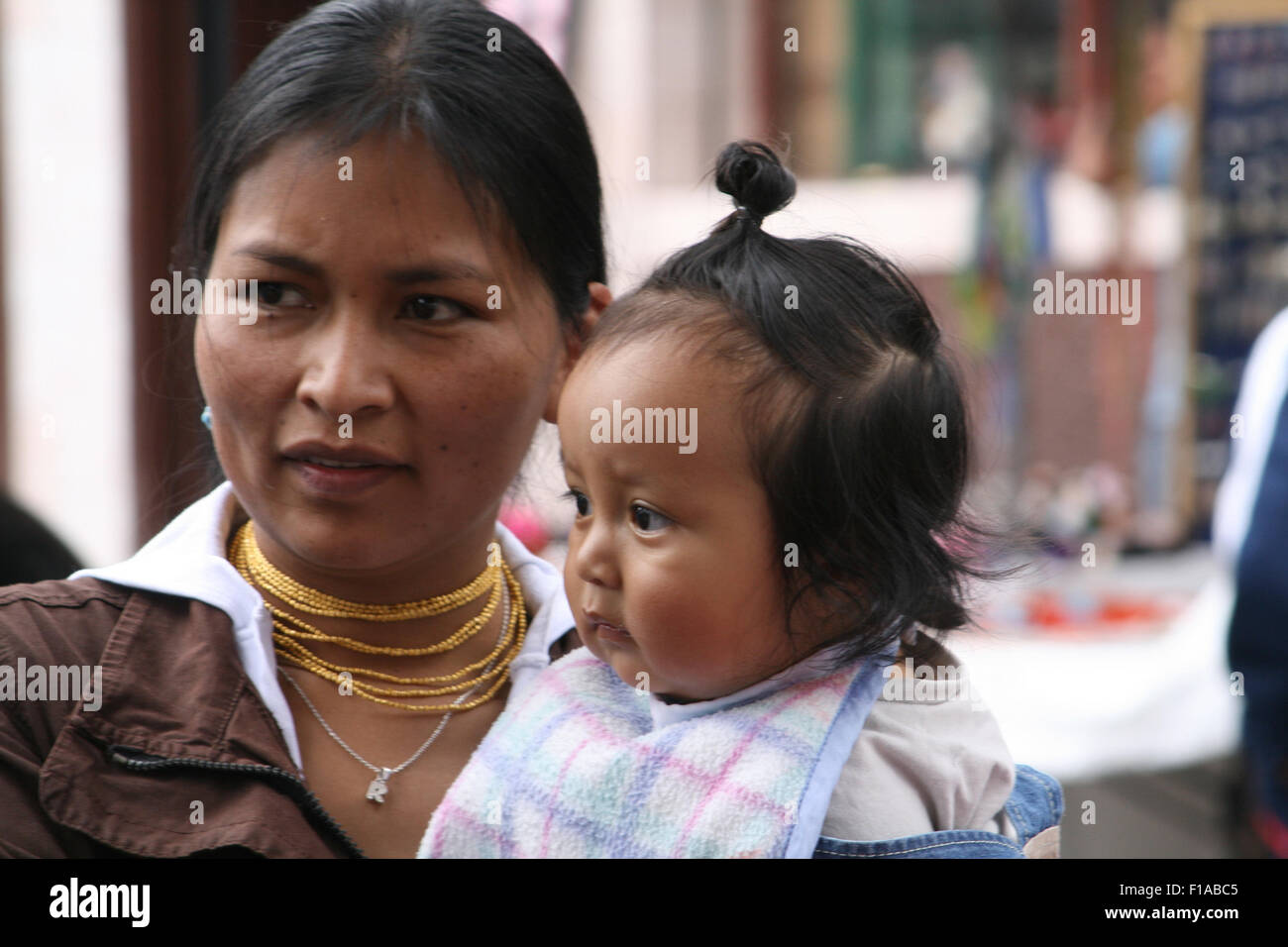 Indigenous woman and child, Otavalo Market, Ecuador Stock Photo
