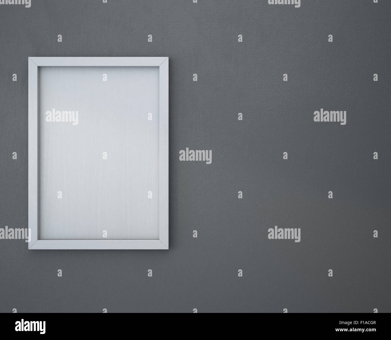 Blank frame on gray wall Stock Photo - Alamy