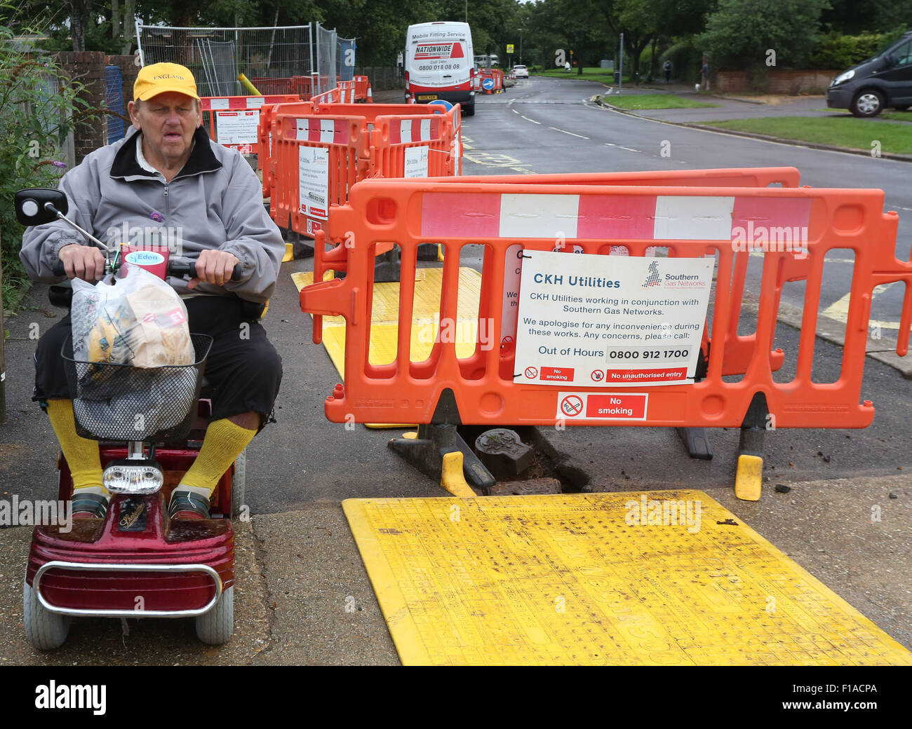 Bridgemary, UK. 31st August, 2015. Gas Works outside  Bedhenham Road Bridgemary  residents were enraged this week after a three-month gas  main replacement project began outside a primary school in the first week of term.  Southern Gas Network contractors where  due to begin the project in Bridgemary on August 7, but delays meant the road did not start to be dug up until August 20   The scheme has been installing new gas main from Bramer Road to  the junction of the Bridgemary Avenue  close to The Bedenham Primary School. Pictured: Resident Michael Bradbury. Credit: UKNIP / Alamy Live News Stock Photo