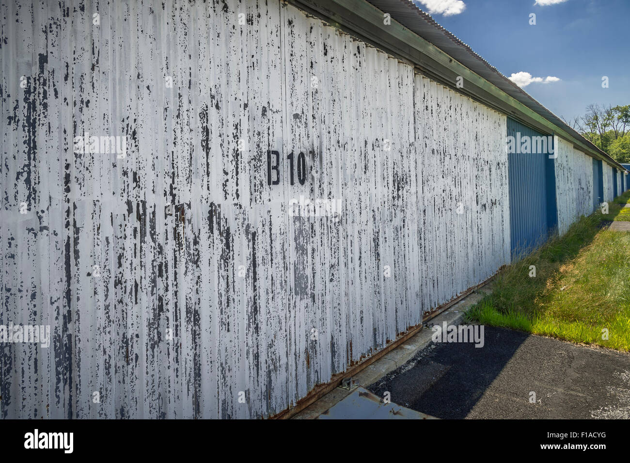 Weathered White Wall Storage Building Stock Photo