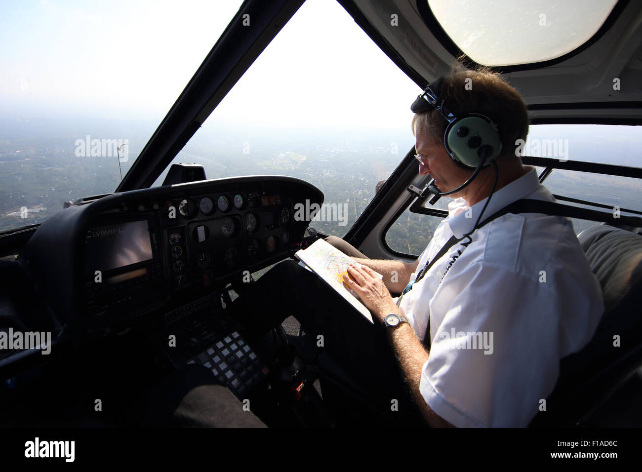 Strausberg, Germany, helicopter pilot during a flight in the cockpit Stock Photo