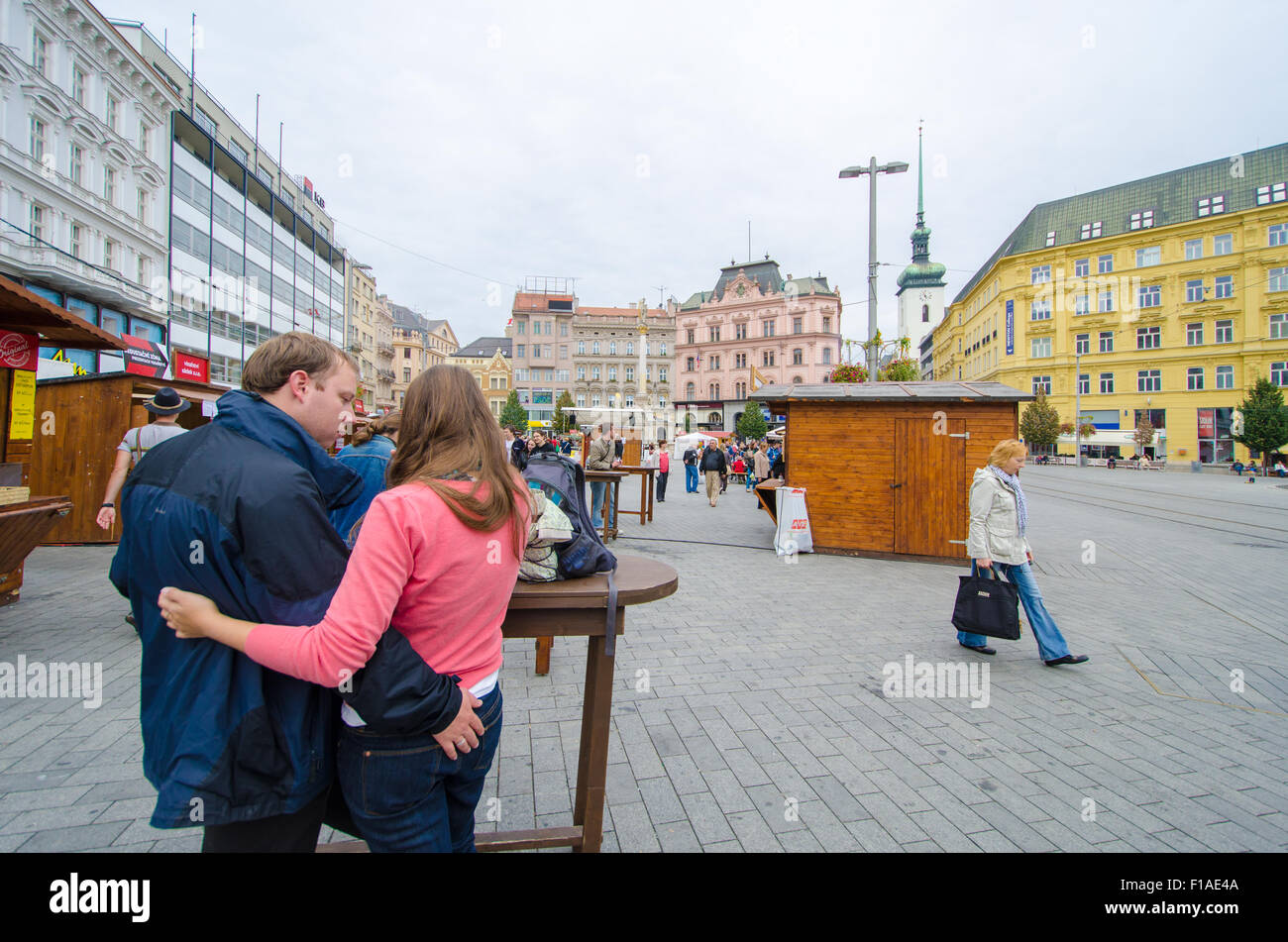 A couple having some drink in the street in Brno. Stock Photo