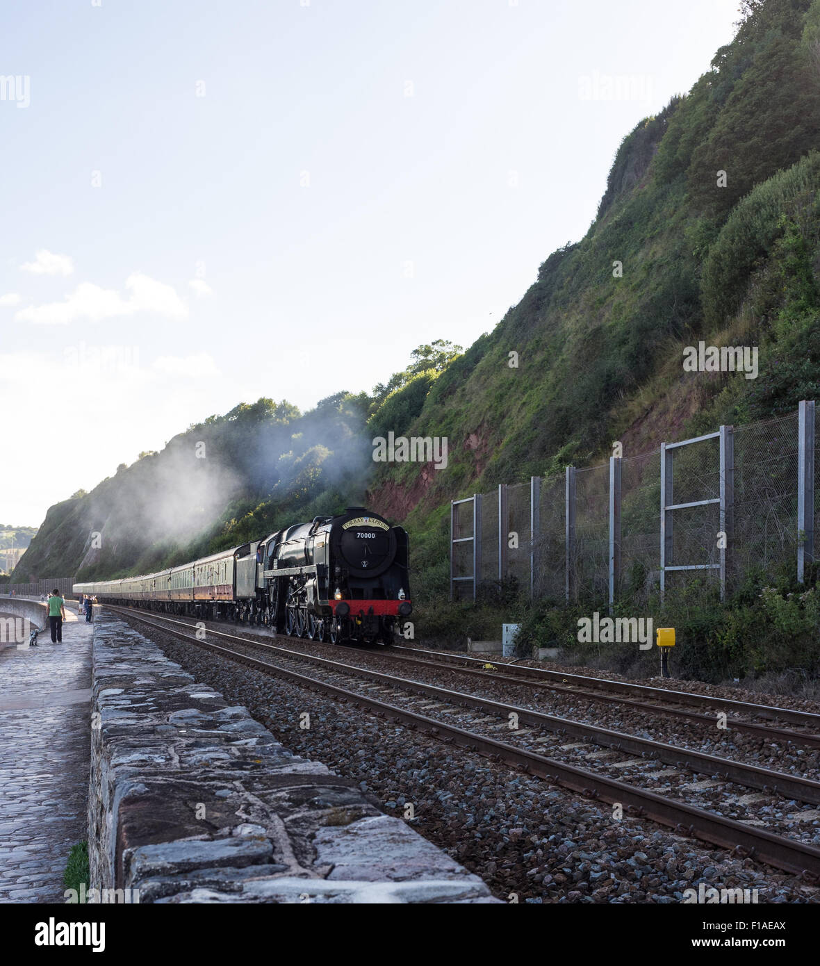 Teignmouth Devon. 2015. The Torbay Express steam train on an excursion along the Brunel railway at Teignmouth. Stock Photo
