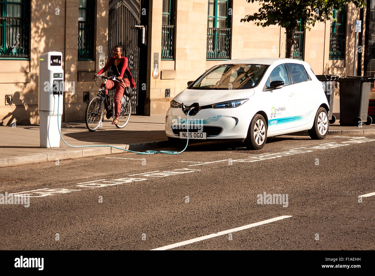 Electric cars parked at the "Electric Vehicles Only" recharging point