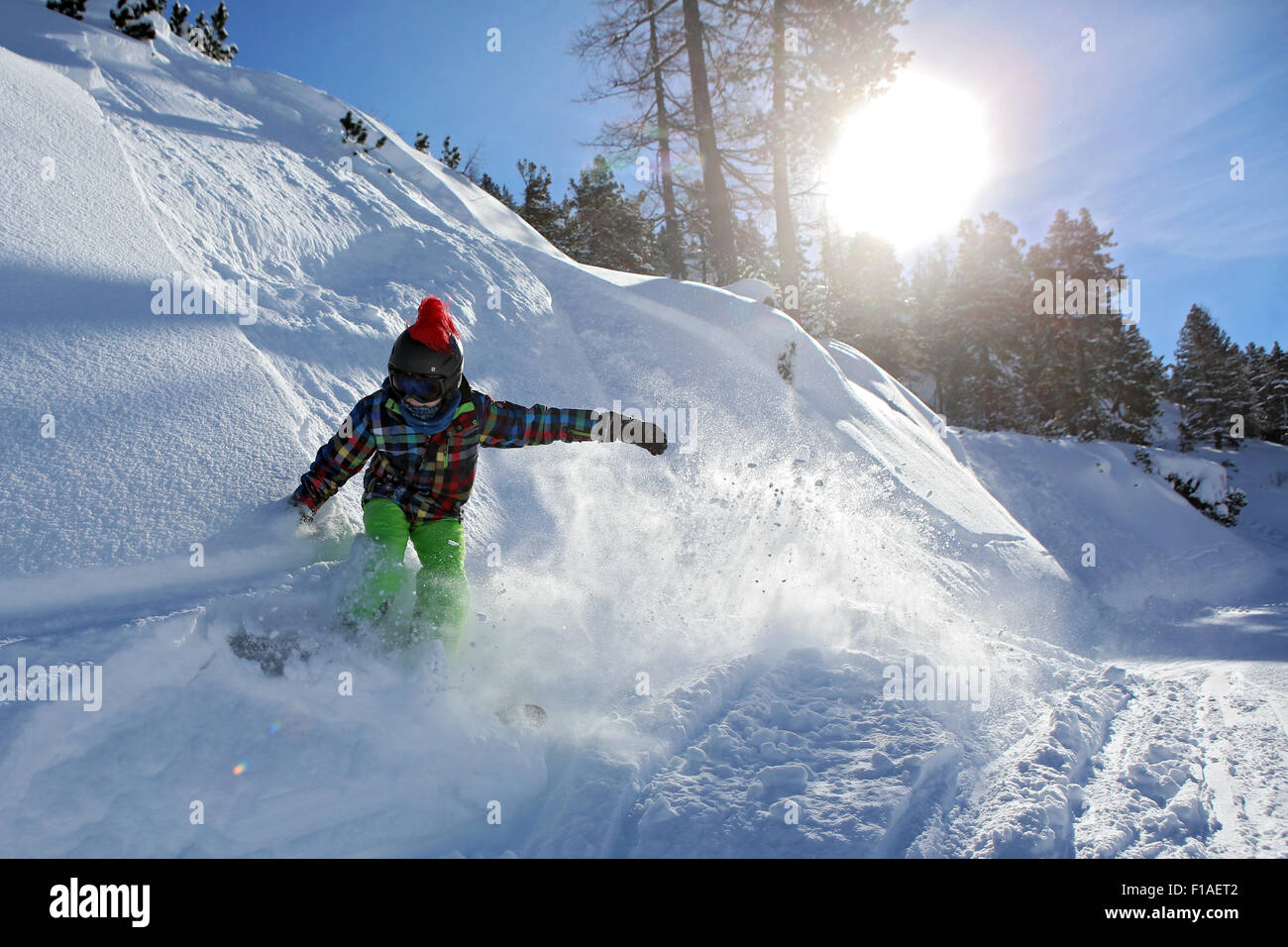 Krippenbrunn, Austria, a boy snowboarding in deep snow Stock Photo