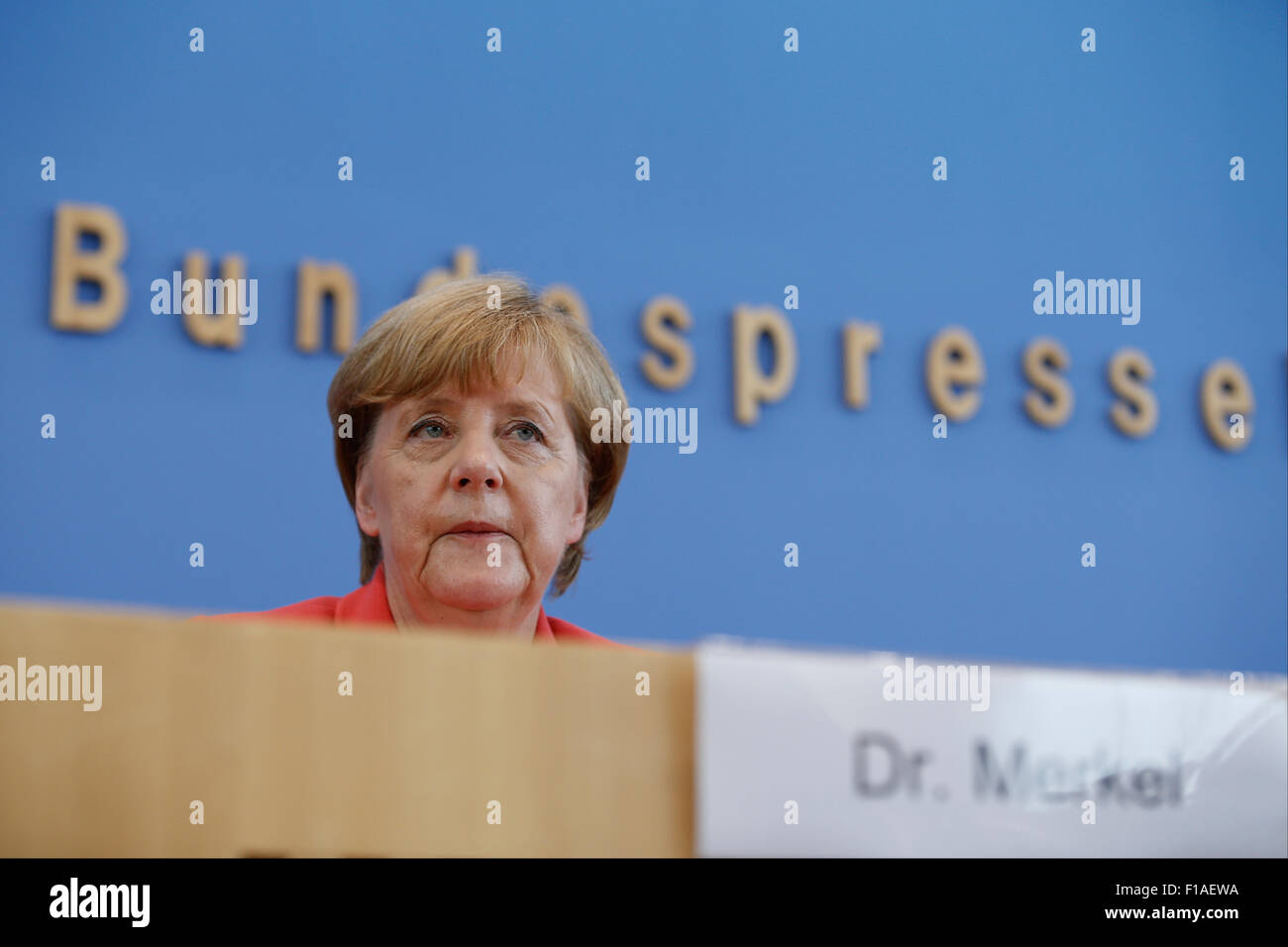 Berlin, Germany. 31st Aug, 2015. German Chancellor Angela Merkel during press conference on foreign and domestic policy at the house of the federal press conference in Berlin, Germany on 31 august 2015. / Picture: Angela Merkel, german chancellor, answering questions about foreign and domestic policy during a press conference at the house of the federal press conference in Berlin. Credit:  Reynaldo Chaib Paganelli/Alamy Live News Stock Photo