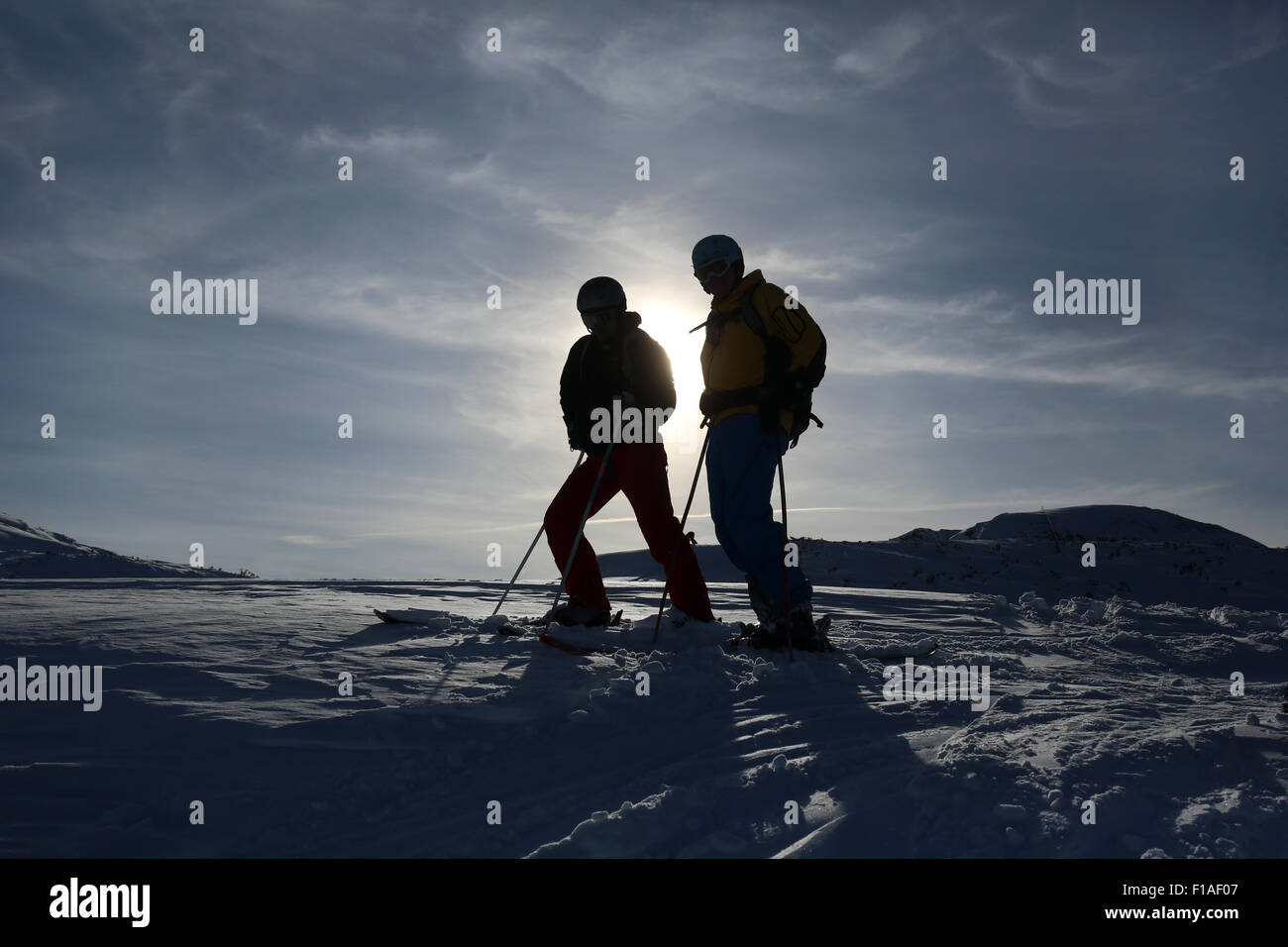Krippenbrunn, Austria, skiers standing in backlight Stock Photo