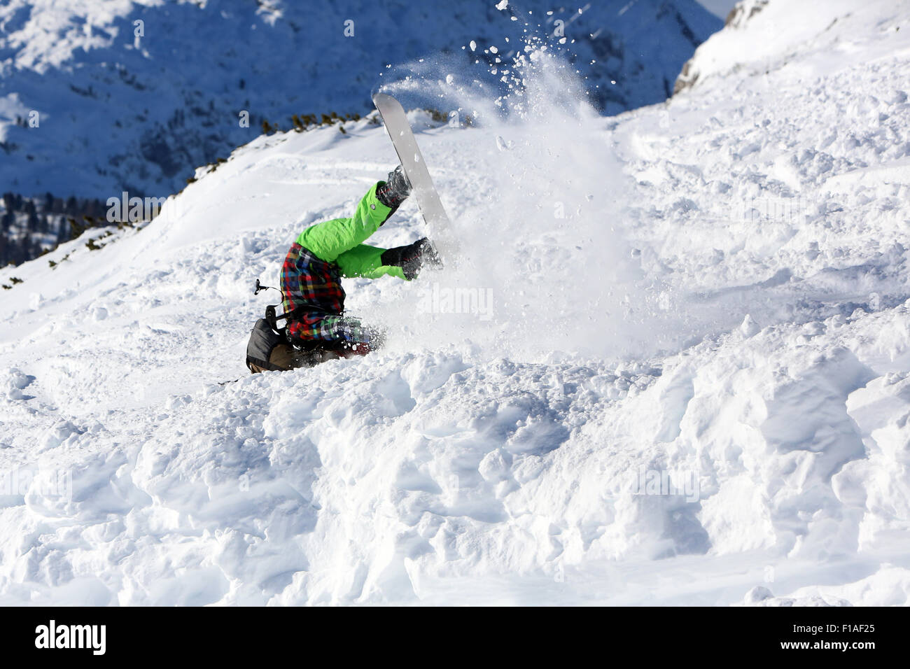 Krippenbrunn, Austria, a boy crashes while snowboarding Stock Photo