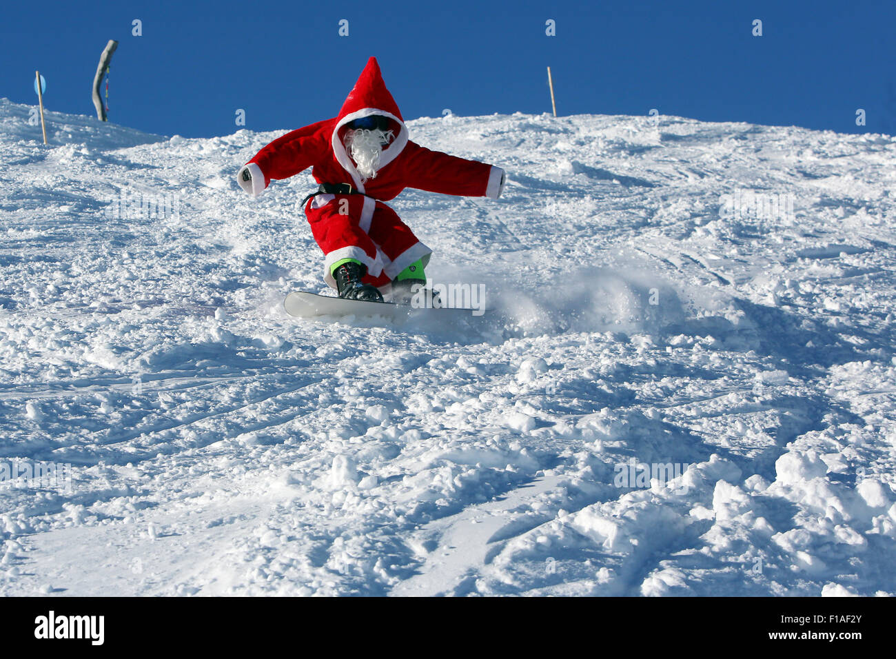Krippenbrunn, Austria, Santa snowboarding Stock Photo
