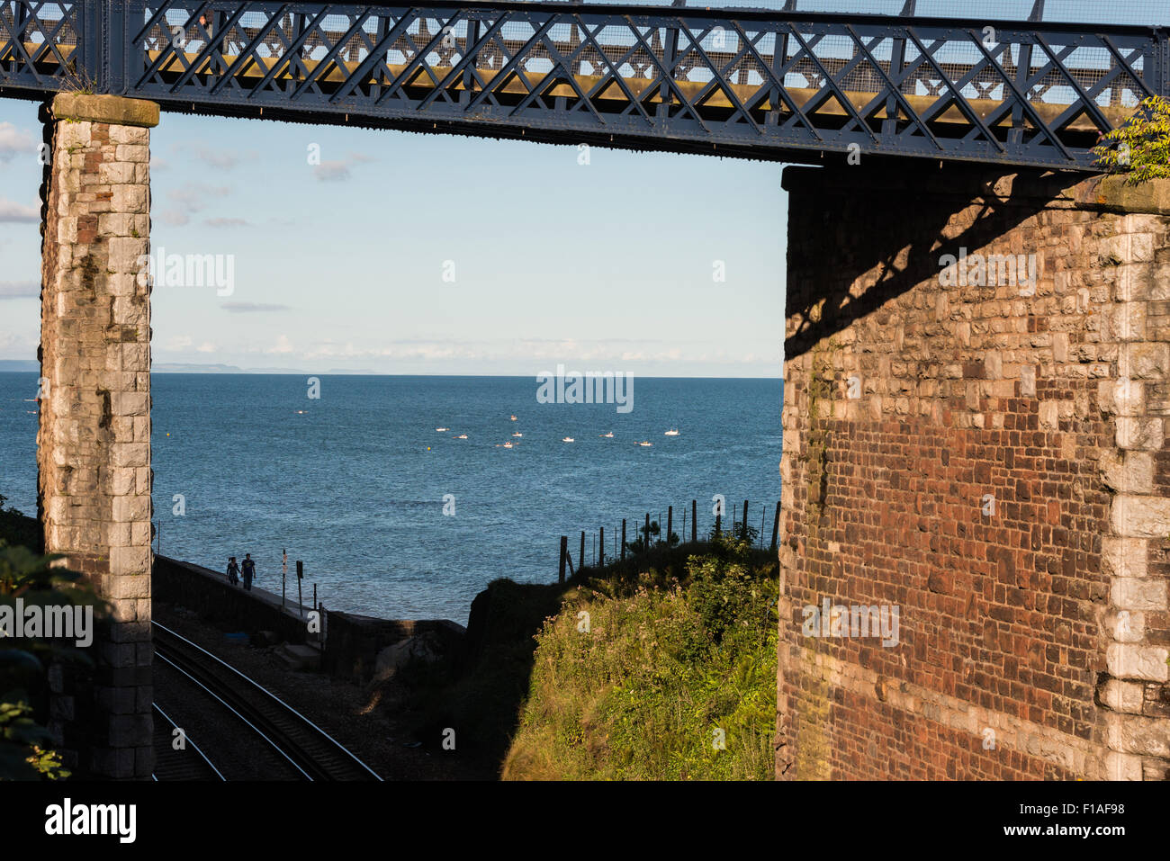 Teignmouth, Devon. 2015, A Victorian pedestrian bridge over the Brunel railway on the coast at Teignmouth. Stock Photo