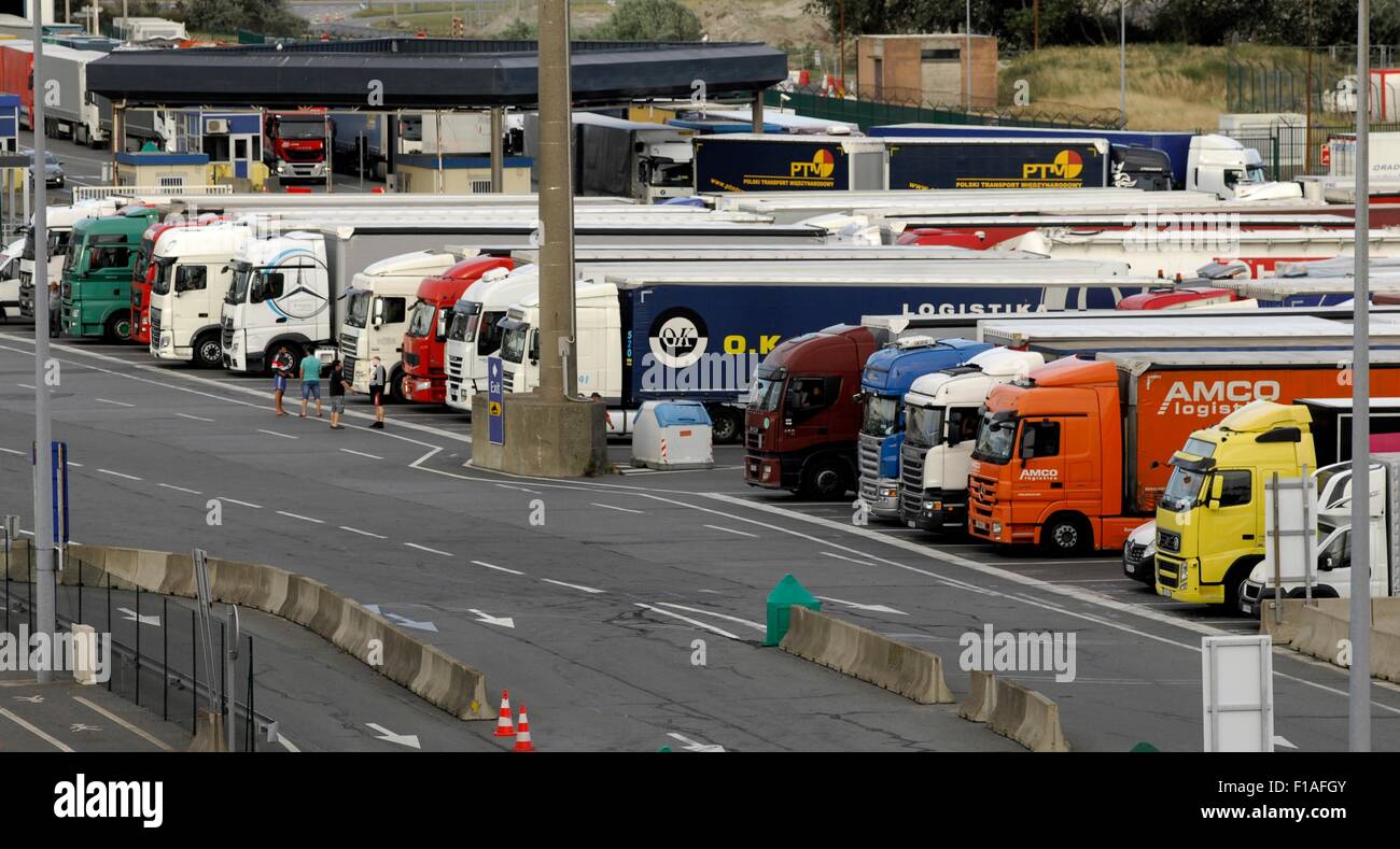 AJAXNETPHOTO. 22ND JULY, 2015. DUNKERQUE, FRANCE. - FREIGHT TRUCKS PARKED IN THE PORT WAITING TO BOARD A CROSS CHANNEL FERRY TO DOVER. PHOTO:JONATHAN EASTLAND/AJAX REF:D152307 5810 Stock Photo