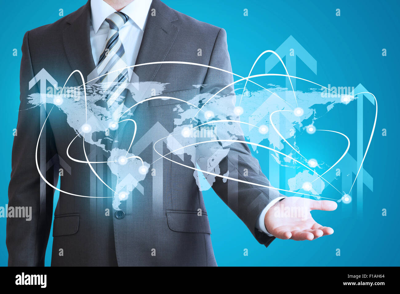 Businessman with world map model Stock Photo - Alamy