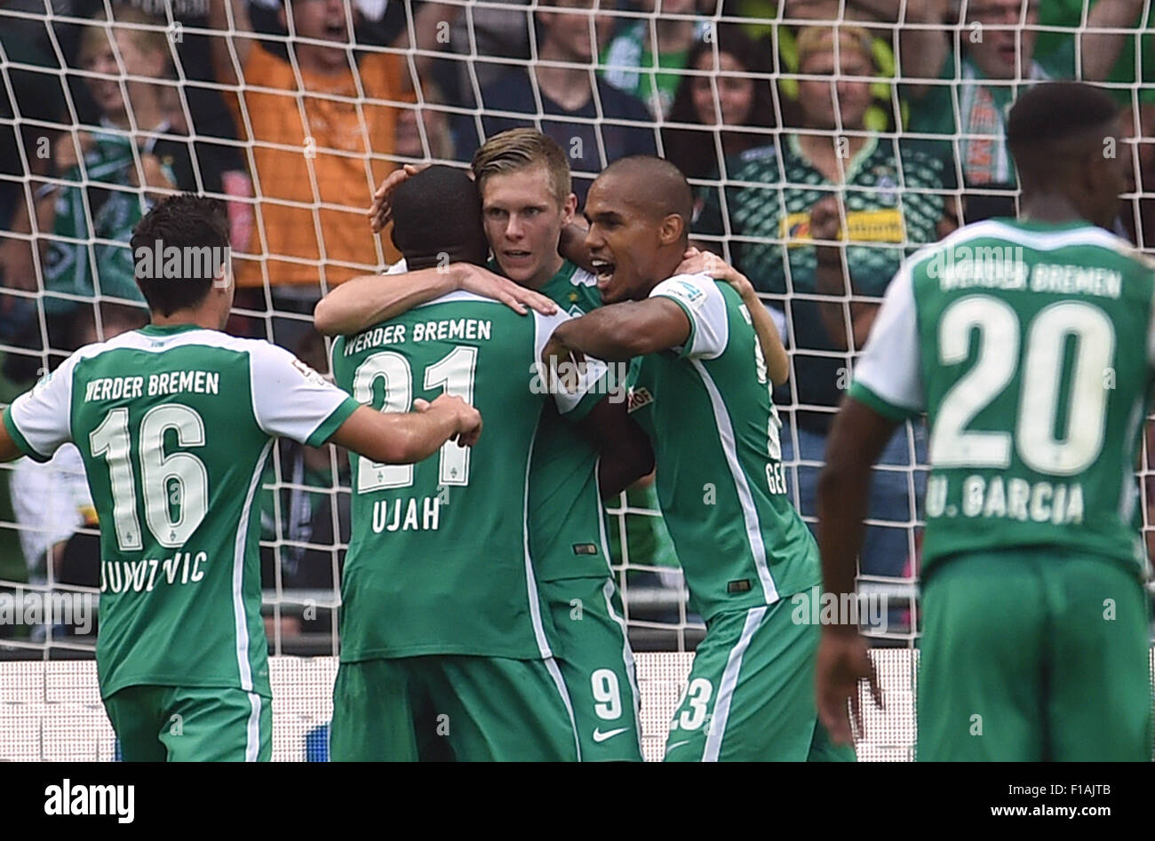 Bremen, Germany. 30th Aug, 2015. Werder's Zlatko Junuzovic (from left to right), Anthony Ujah, Aron Johannsson, Theodor Gebre Selassie and Ulisses Garcia celebrate Johannsson's 1-0 goal during the German Bundesliga soccer match between Werder Bremen and Borussia Moenchengladbach at the Weserstadion in Bremen, Germany, 30 August 2015. PHOTO: CARMEN JASPERSEN/DPA (EMBARGO CONDITIONS - ATTENTION: Due to the accreditation guidelines, the DFL only permits the publication and utilisation of up to 15 pictures per match on the internet and in online media during the match.) © dpa/Alamy Live News Stock Photo