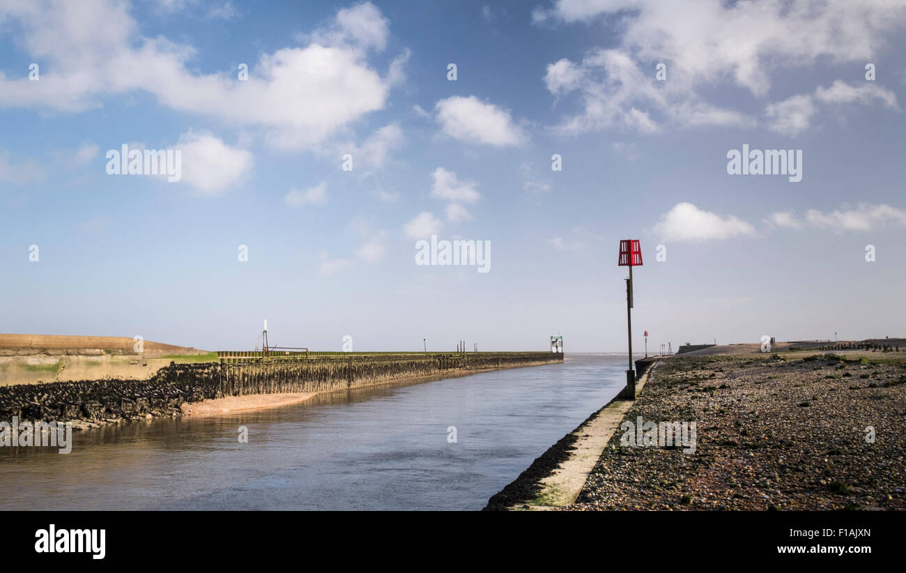 The River Rother, Rye Harbour, East Sussex, England, UK where it flows into Rye Bay Stock Photo