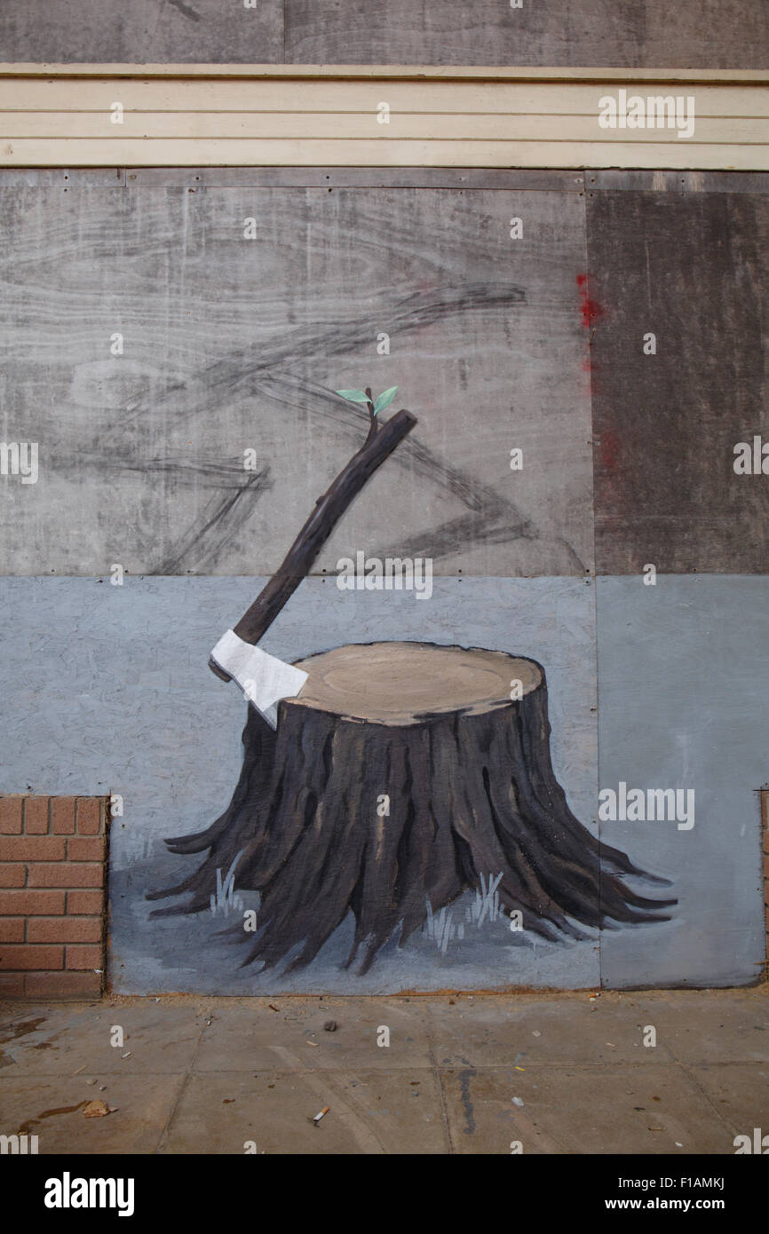 Banksy's Dismaland Axe/tree stump art Stock Photo Alamy