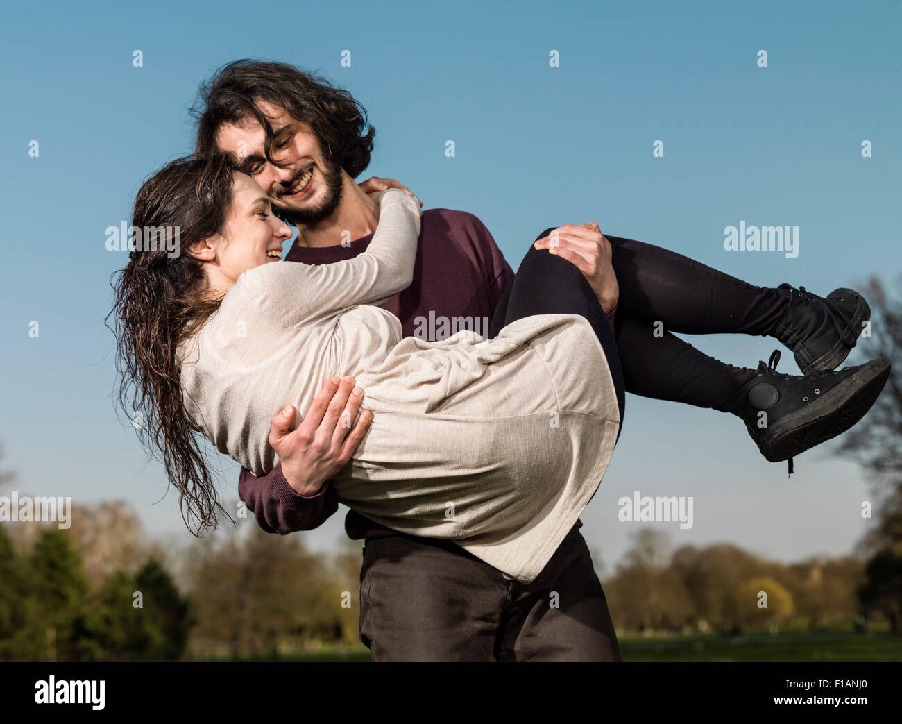 Young in their arms hi-res stock photography and images - Alamy