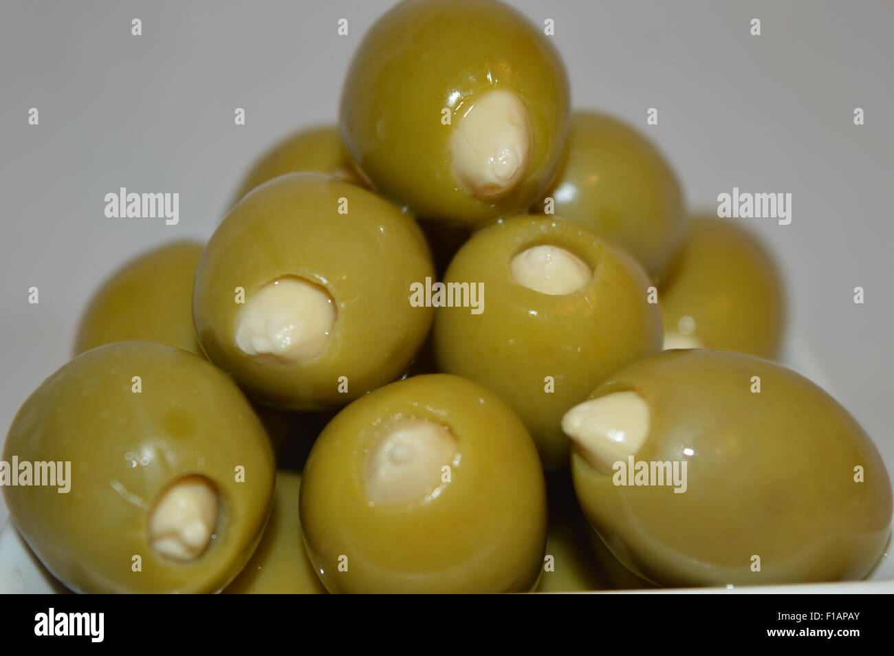 green olives stuffed with almond Stock Photo Alamy