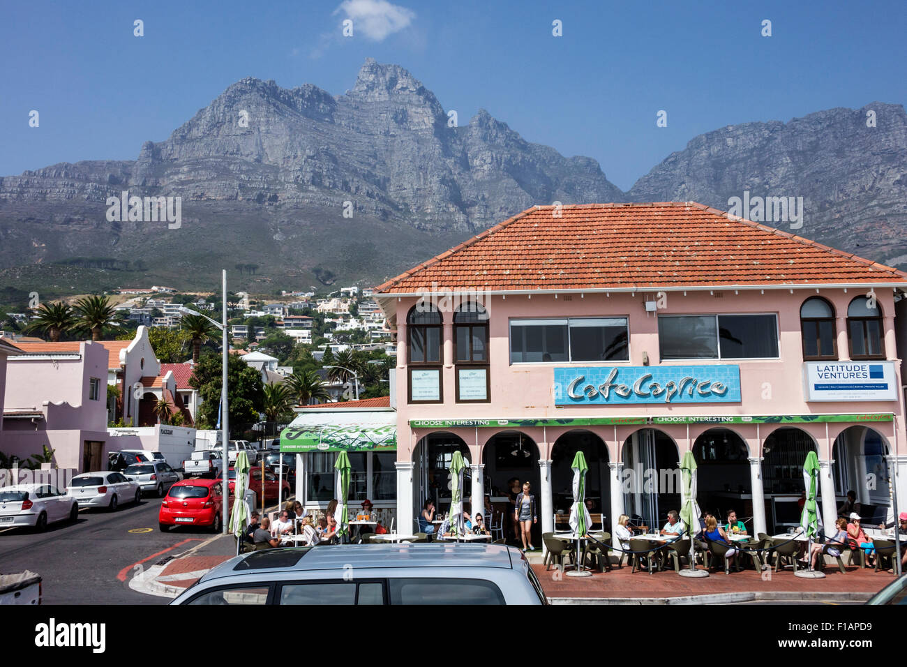 Cape Town South Africa,African,Camps Bay water,Victoria Road,Table Mountain  National Park,Cafe Caprice,restaurant restaurants food dining eating out c  Stock Photo - Alamy