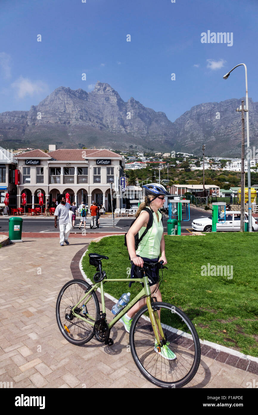Cape Town South Africa,Camps Bay,Victoria Road,Table Mountain National Park,beach park,bike path,woman female women,bicycle,bicycling,riding,biking,ri Stock Photo