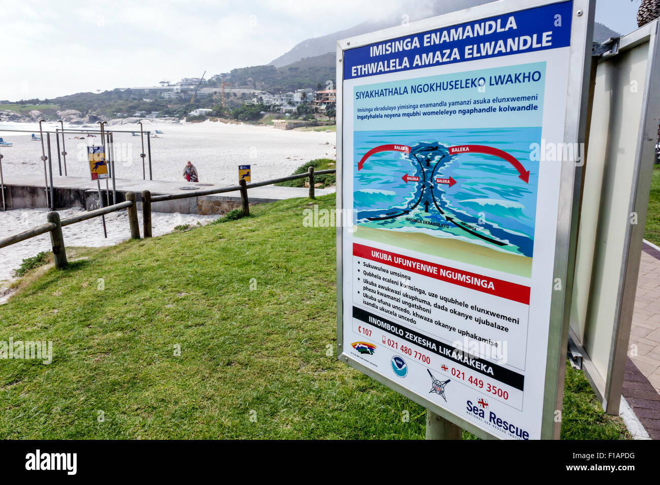 Cape Town South Africa,Camps Bay,Victoria Road,Table Mountain National Park,public beach park,sign,warning,riptide,riptides,Zulu,SAfri150312037 Stock Photo