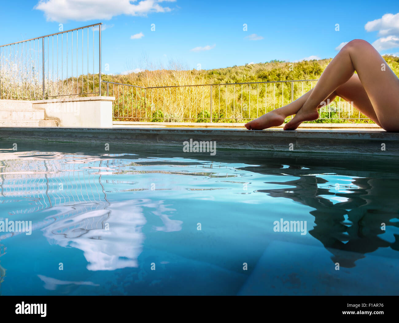 Woman in geothermal water pool of spa Stock Photo