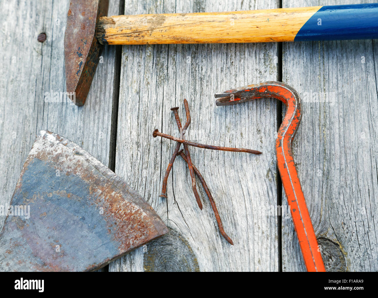 claw hammer and rusty nails on the old boards Stock Photo Alamy