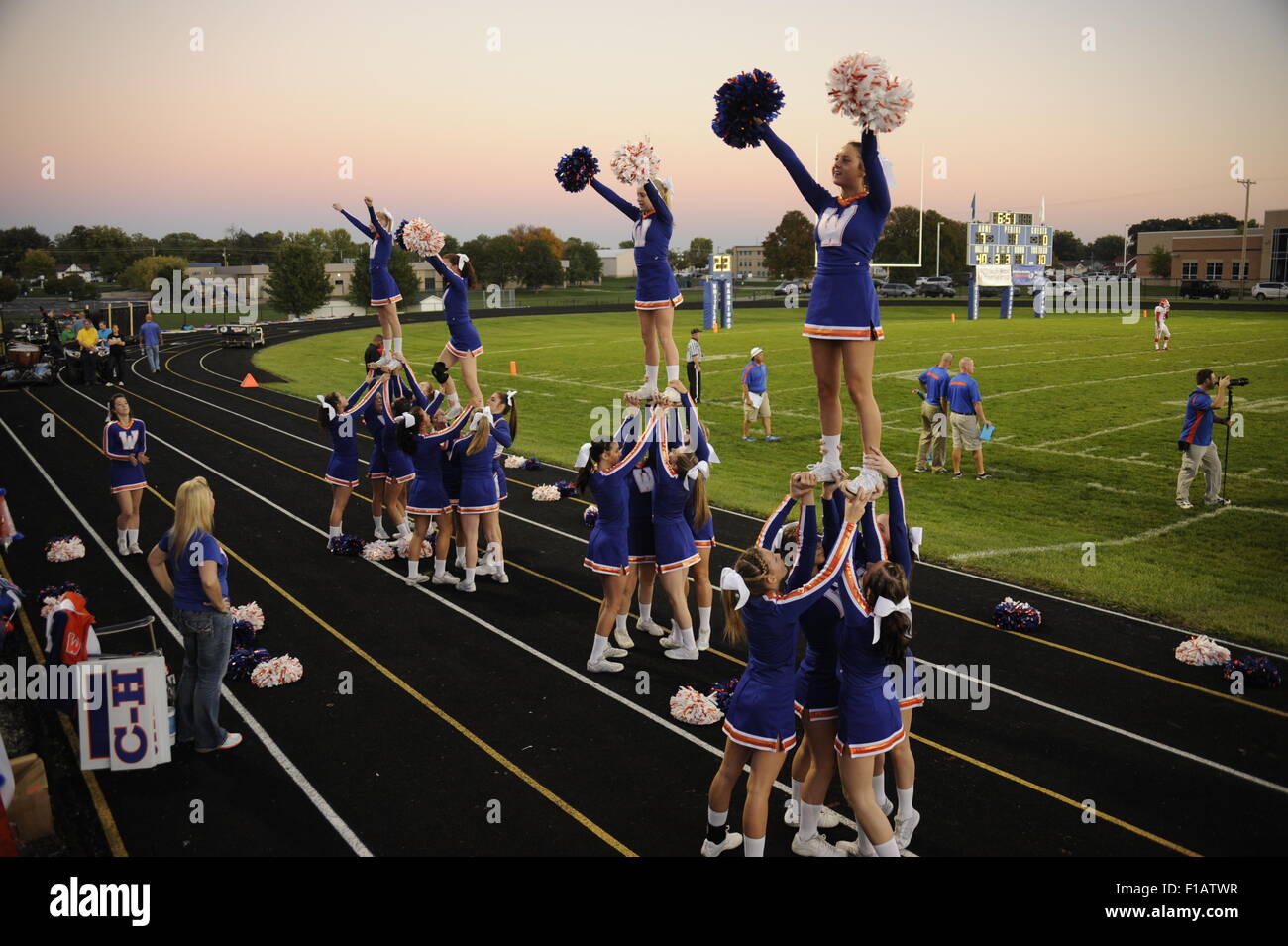 Cheerleaders at football game, Whiteland, Indiana Stock Photo