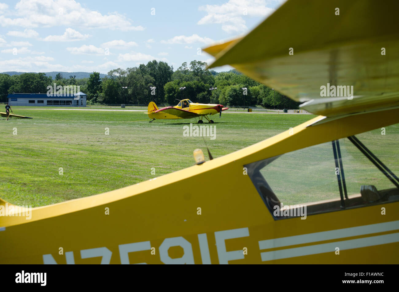 Tow planes on grass runways. Stock Photo
