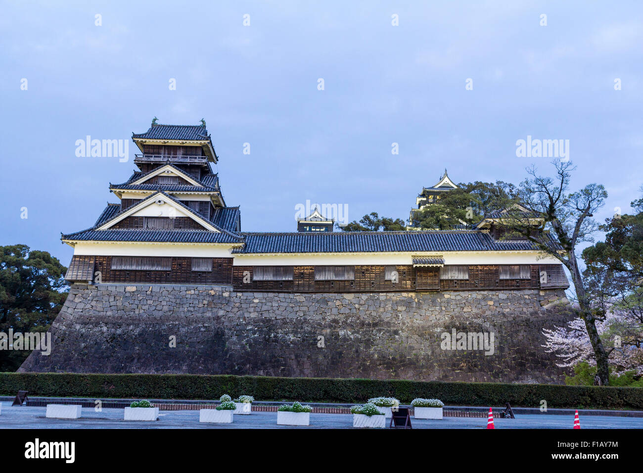 Kumamoto castle before the 2016 earthquake. The multi story Uto yagura, turret with long corridor on top of Ishigaki stone walls at dusk , blue hour. Stock Photo