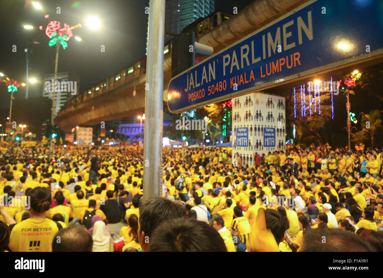 KUALA LUMPUR, MALAYSIA, 29 AUG 2015 : Yellow shirt malaysians gather at Jalan Parlimen near Merdeka square during BERSIH rally. Stock Photo