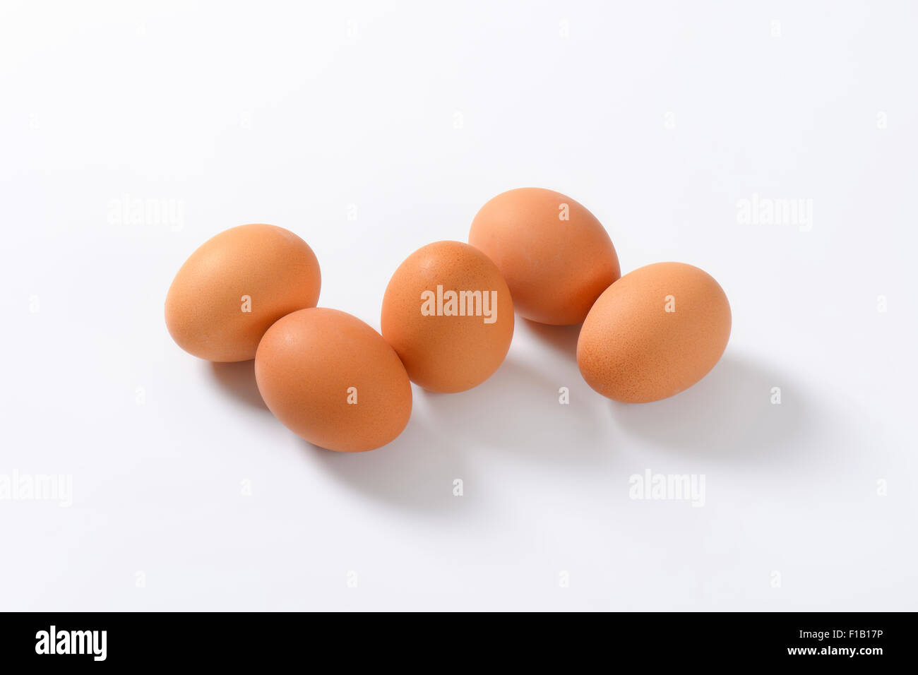 organic eggs on white background Stock Photo - Alamy