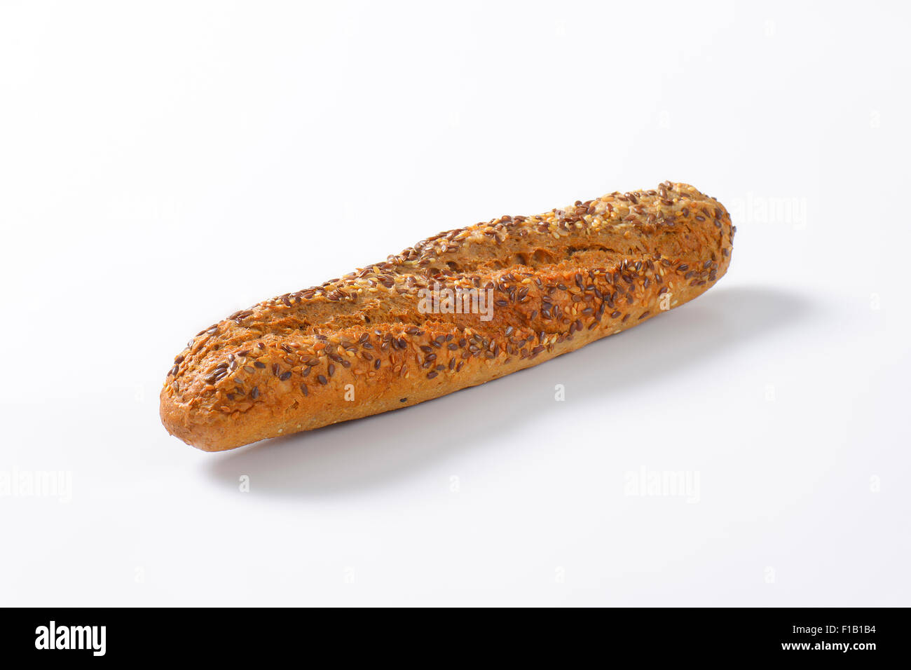 fresh bread baguette with seeds on white background Stock Photo - Alamy